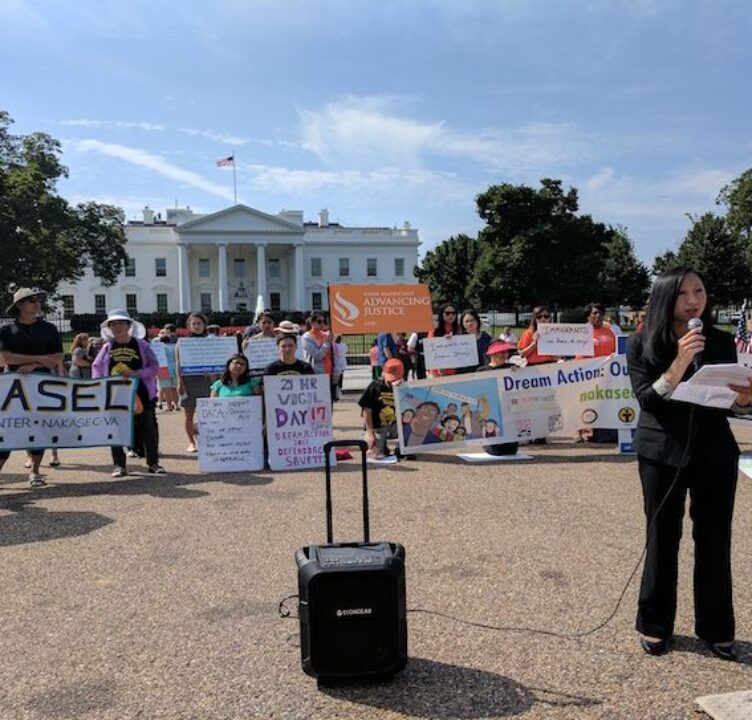 SEARAC Executive Director Quyen Dinh speaks at an AAPI rally led by NAKASEC to defend DACA.