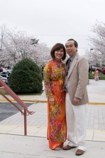 A couple near a stairway.