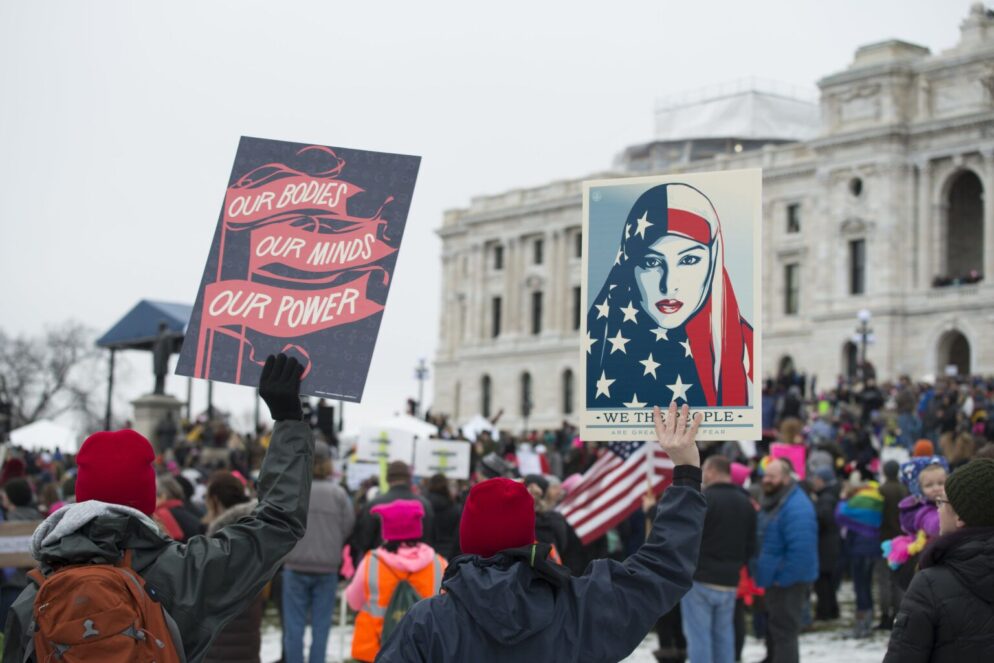 People holding up signs.