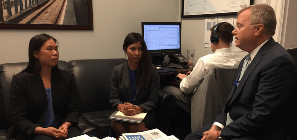 Cheryl (left) talks with a staff member at Capitol Hill.