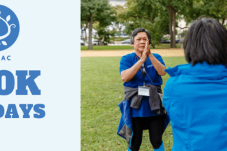 An end of year fundraising campaign header with people praying together