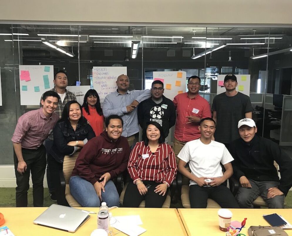 A group of people smiling together