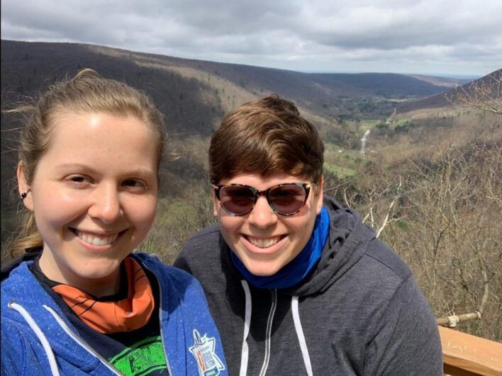 Jenna (left) and her partner, Carly, hiking in Ontario County, NY.