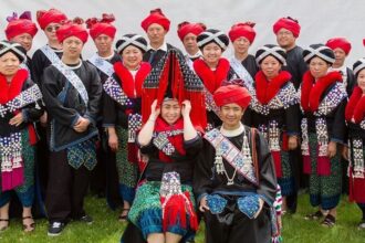 A group of Iu Miens in traditional Iu Mien clothes at a wedding.