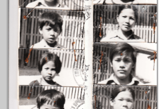 Black and white pictures of individual family members of various ages from children to teens and young adults to elders. Each person is shown from the shoulder up and each is looking directly at the camera, some smiling and others with a neutral expression.