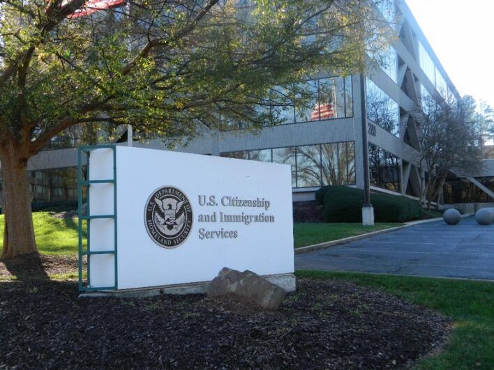 A sign for the US Citizenship and Immigration Services.