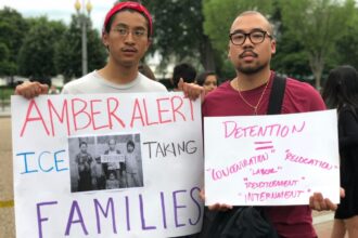 Two men bringing attention to deportation.