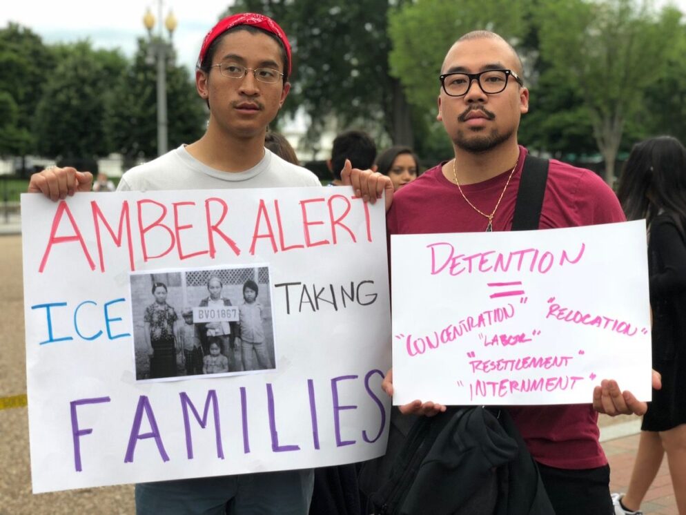 Two men bringing attention to deportation.