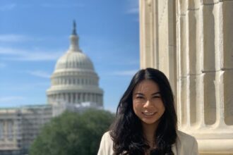 An smiling at Capitol Hill.