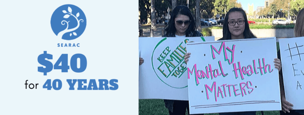 Person holds sign saying My Mental Health Matters