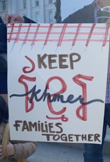 Poster with brown, pink, and blue writing saying Keep Families Together