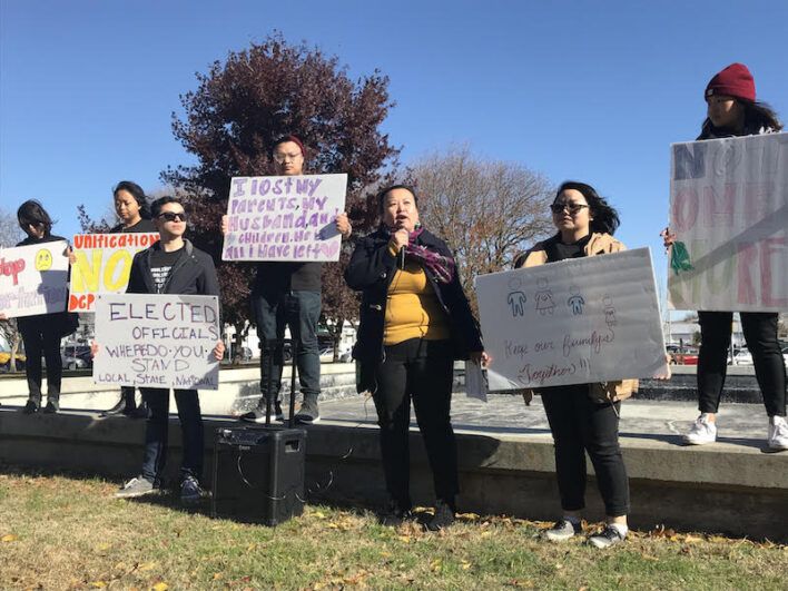 people holding signs