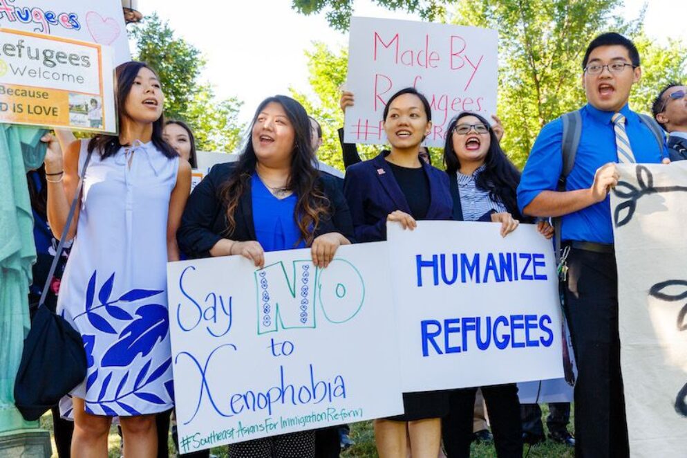 People holding signs and fighting for justice together