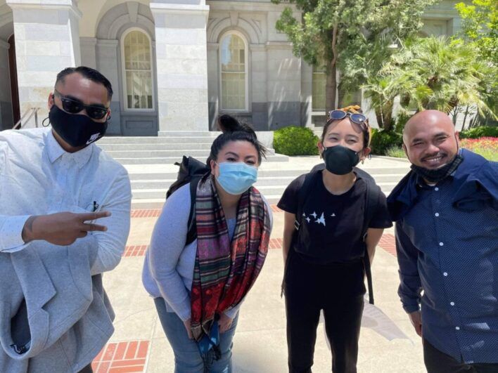 Tith (left) and Bun (right) with community members at a 2021 rally in support of California’s VISION Act (photo courtesy of Chanthon Bun)