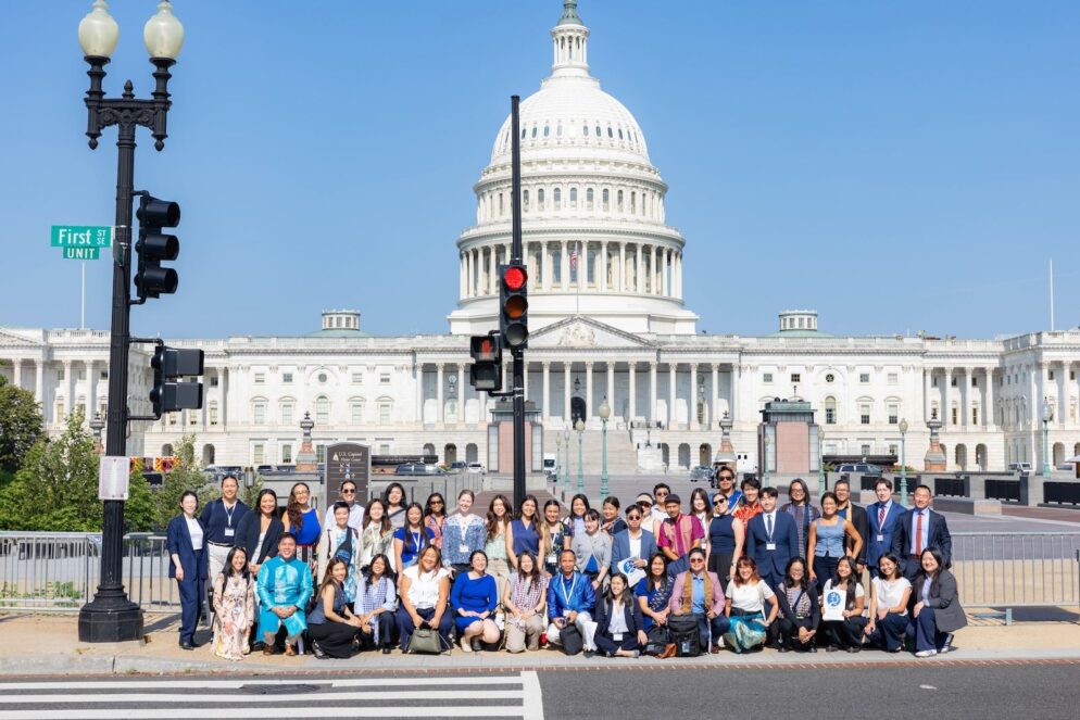 Dozens of individuals in front of the Capitol Building in Washington DC