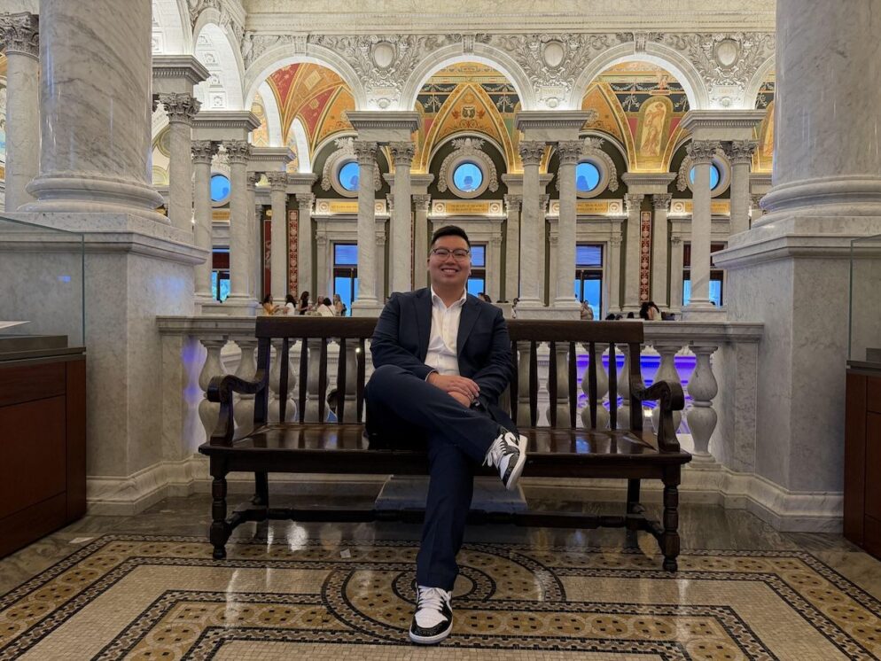 person sitting on bench