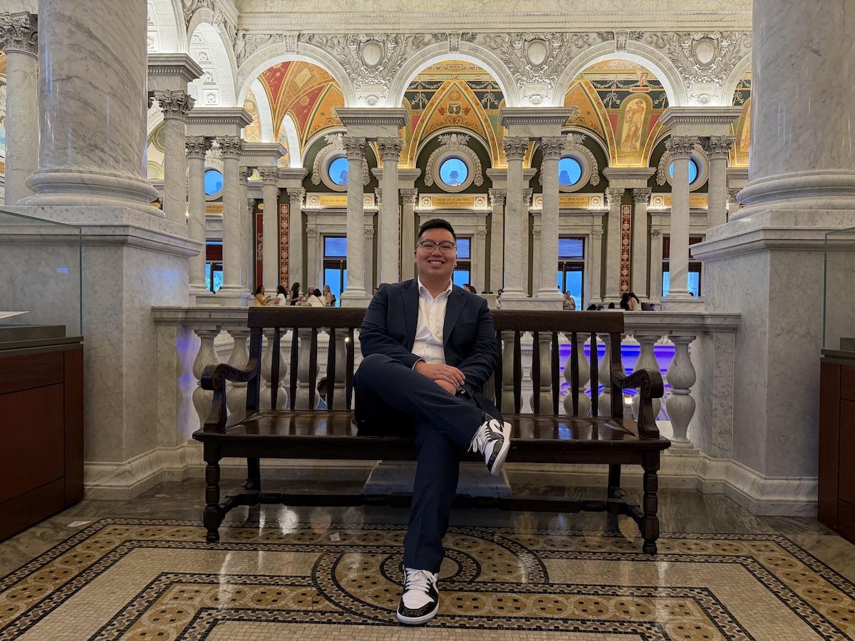 person sitting on bench